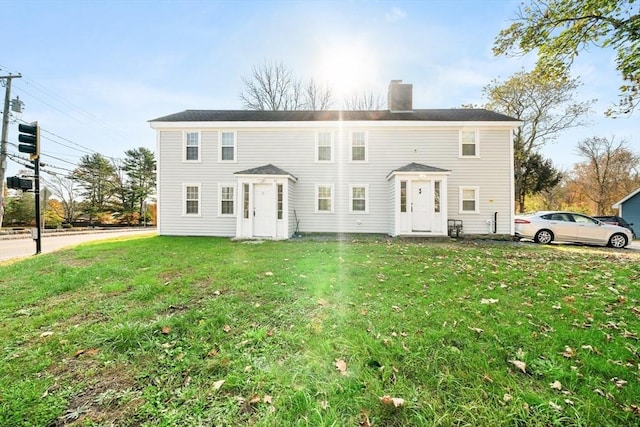 101 Old Westport Rd, Dartmouth, MA 02747 - view of property featuring a chimney and a front yard
