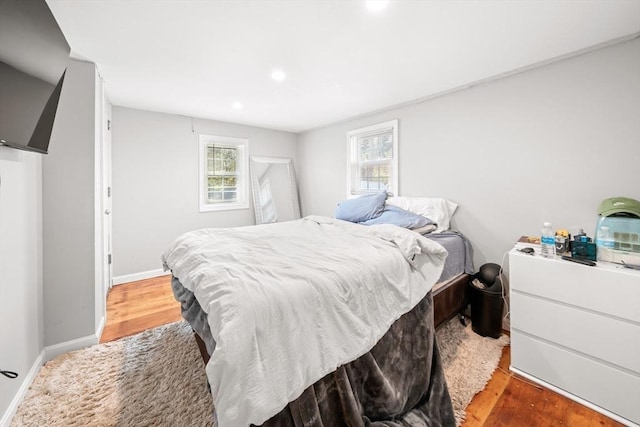 101 Old Westport Rd, Dartmouth, MA 02747 - bedroom with wood finished floors, multiple windows, and recessed lighting