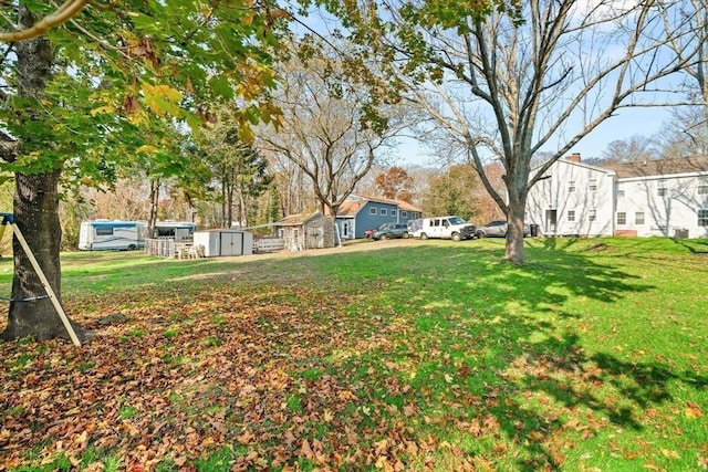 101 Old Westport Rd, Dartmouth, MA 02747 - view of grassy yard featuring a storage shed