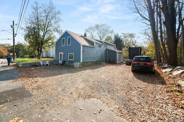 101 Old Westport Rd, Dartmouth, MA 02747 - view of side of home with driveway