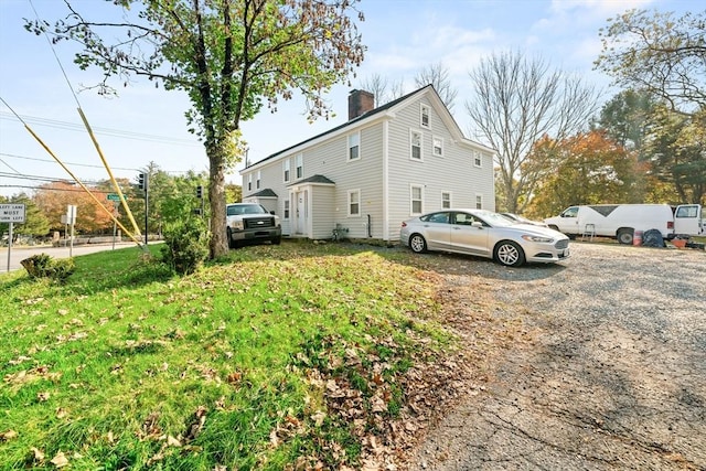 101 Old Westport Rd, Dartmouth, MA 02747 - view of home's exterior featuring a chimney