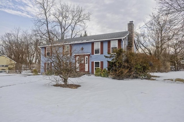 bi-level home with a chimney