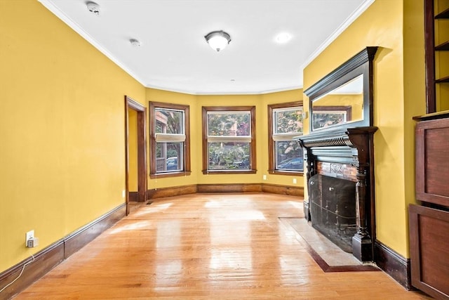 41 Cushing Ave Unit 1, Boston, MA 02125 - unfurnished living room with a premium fireplace, crown molding, and light wood finished floors