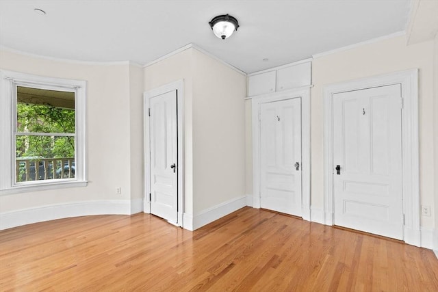 41 Cushing Ave Unit 1, Boston, MA 02125 - unfurnished bedroom with ornamental molding and light wood-style floors