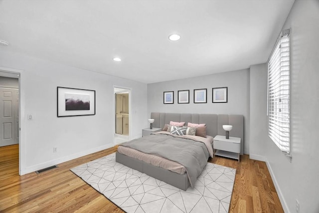 bedroom featuring light wood-type flooring