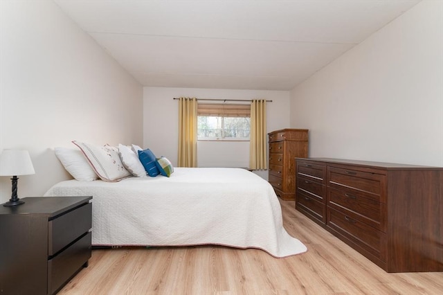 bedroom with light wood-type flooring