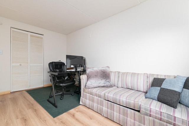 home office with wood-type flooring