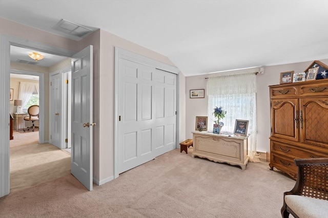 sitting room with light colored carpet and visible vents