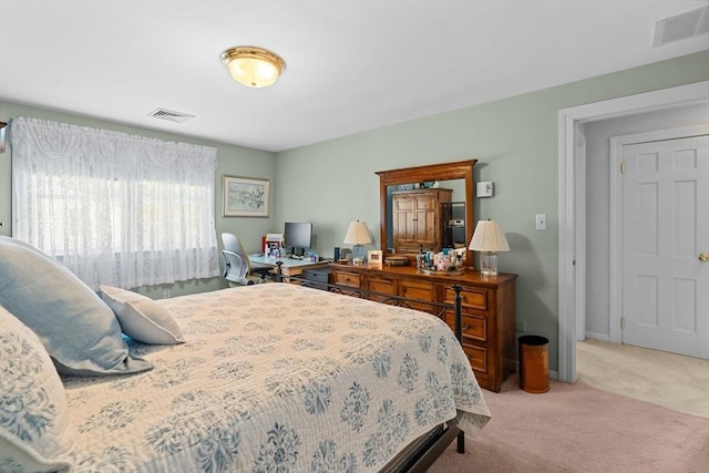 carpeted bedroom with visible vents