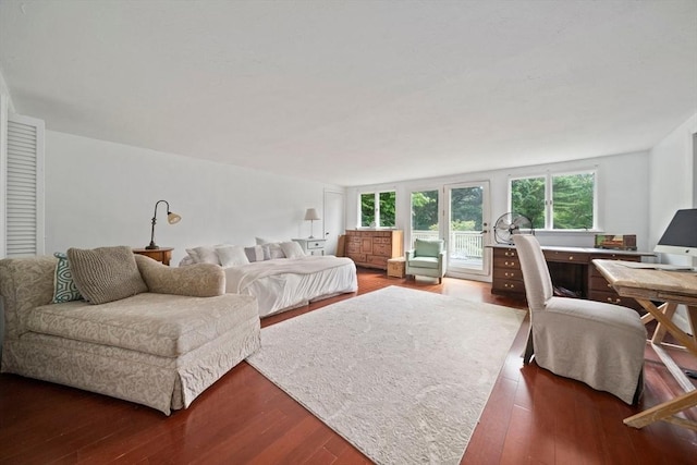 bedroom with wood-type flooring