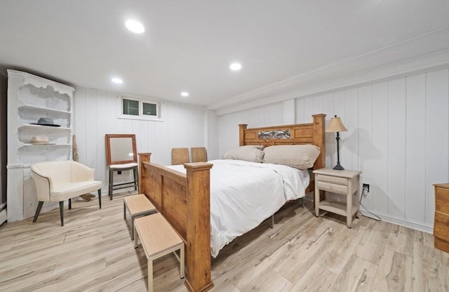 bedroom featuring light hardwood / wood-style floors