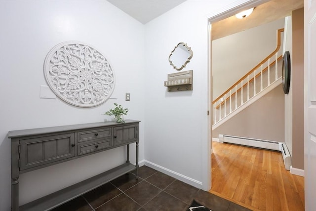 32 Lowe Meadow Ln, North Attleboro, MA 02760 - entrance foyer with baseboards, stairway, dark tile patterned flooring, and baseboard heating