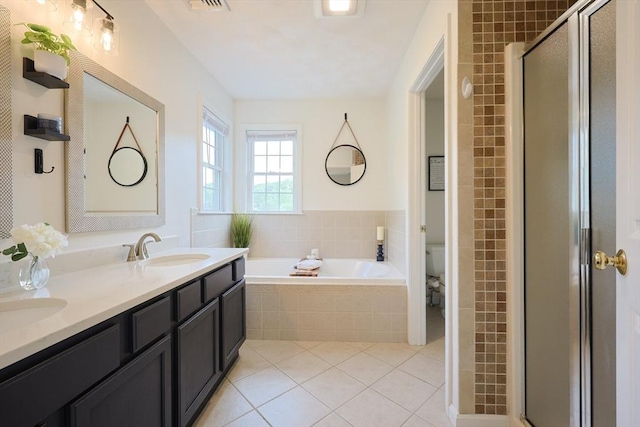 32 Lowe Meadow Ln, North Attleboro, MA 02760 - full bathroom with a garden tub, a shower stall, double vanity, tile patterned floors, and toilet