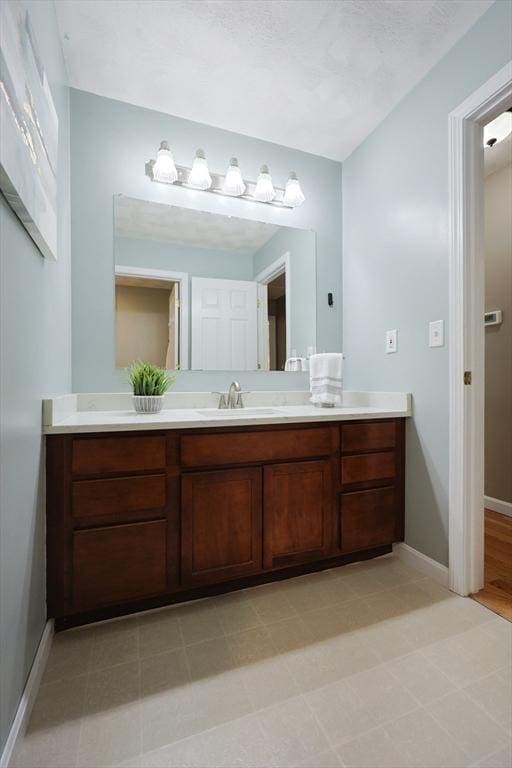 32 Lowe Meadow Ln, North Attleboro, MA 02760 - bathroom featuring vanity and baseboards