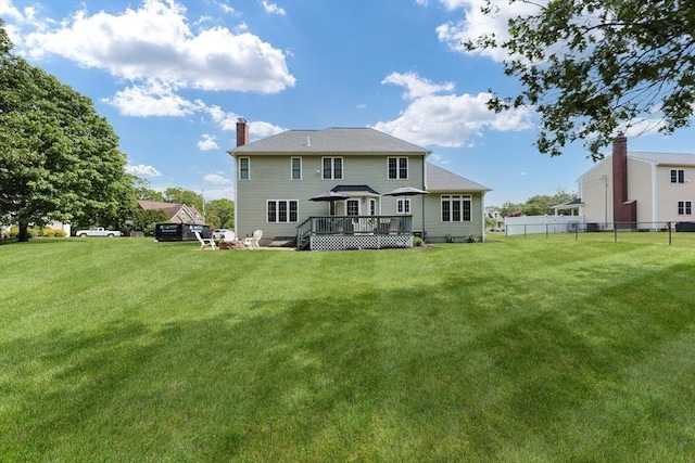 32 Lowe Meadow Ln, North Attleboro, MA 02760 - rear view of property with a deck and a chimney