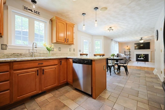 32 Lowe Meadow Ln, North Attleboro, MA 02760 - kitchen with dishwasher, a sink, healthy amount of natural light, a peninsula, and a textured ceiling