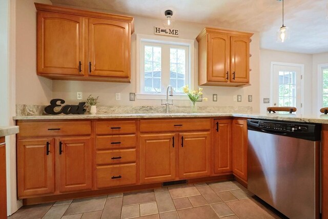 32 Lowe Meadow Ln, North Attleboro, MA 02760 - kitchen with stainless steel dishwasher, plenty of natural light, a sink, and light stone counters