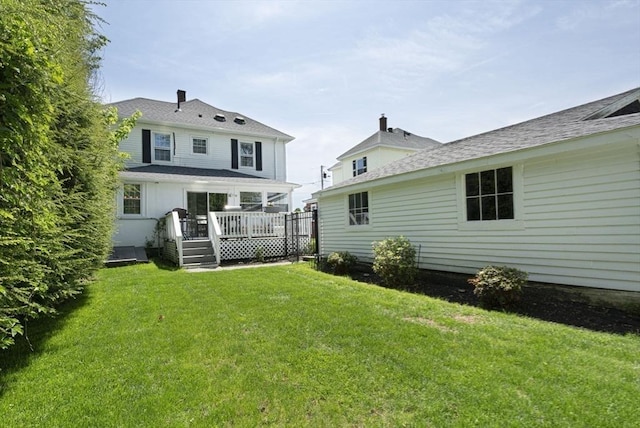3 Worcester, Clinton, MA 01510 - rear view of property with a deck, a lawn, and roof with shingles