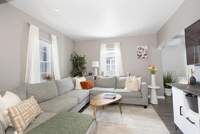 3 Worcester, Clinton, MA 01510 - living room featuring arched walkways, wood finished floors, and recessed lighting