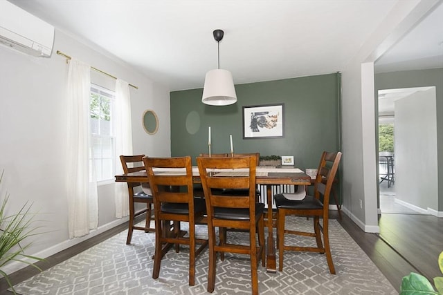 3 Worcester, Clinton, MA 01510 - dining space featuring a wall mounted air conditioner, wood finished floors, and baseboards