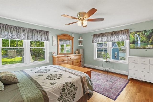 167 Montaup Ave, Dracut, MA 01826 - bedroom featuring wood finished floors, ceiling fan, and baseboards