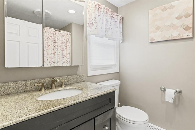 167 Montaup Ave, Dracut, MA 01826 - bathroom with toilet, vanity, and curtained shower