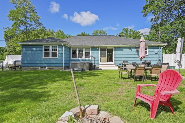 167 Montaup Ave, Dracut, MA 01826 - rear view of property featuring entry steps, a shingled roof, and a hot tub