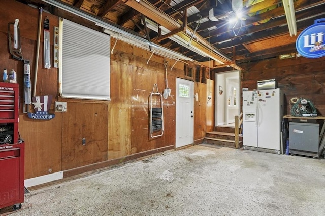 167 Montaup Ave, Dracut, MA 01826 - garage featuring white fridge with ice dispenser