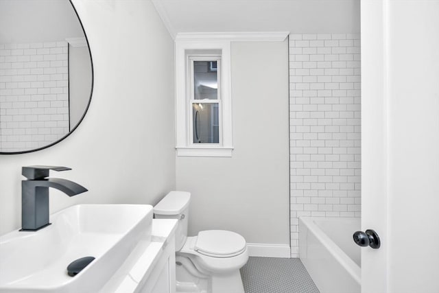 full bathroom featuring tiled shower / bath combo, tile patterned floors, crown molding, toilet, and vanity