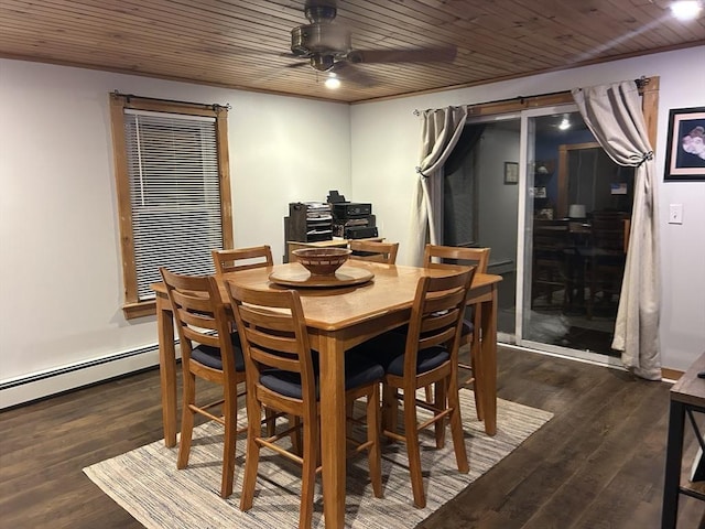 dining room with wood ceiling, a barn door, and wood finished floors