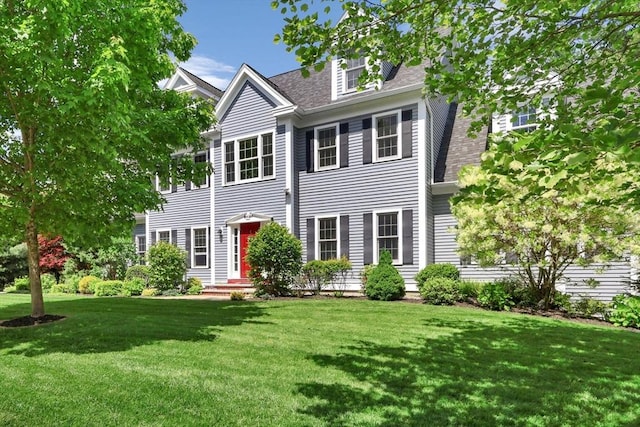 52 Sylvan Dr, Stow, MA 01775 - colonial home with a front lawn and roof with shingles