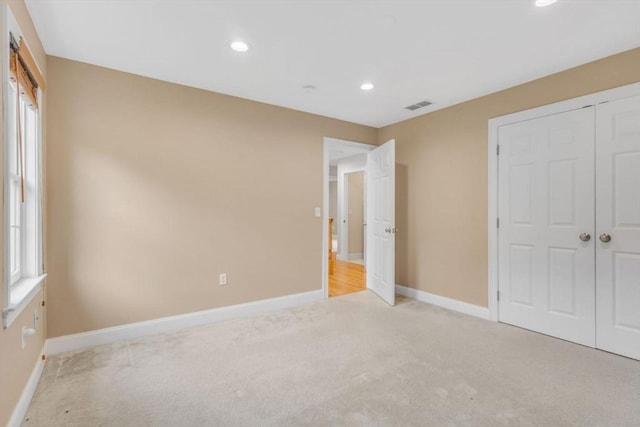 52 Sylvan Dr, Stow, MA 01775 - unfurnished bedroom with light carpet, recessed lighting, and a closet