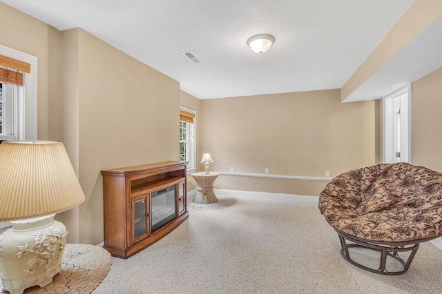 52 Sylvan Dr, Stow, MA 01775 - living area with a glass covered fireplace and carpet