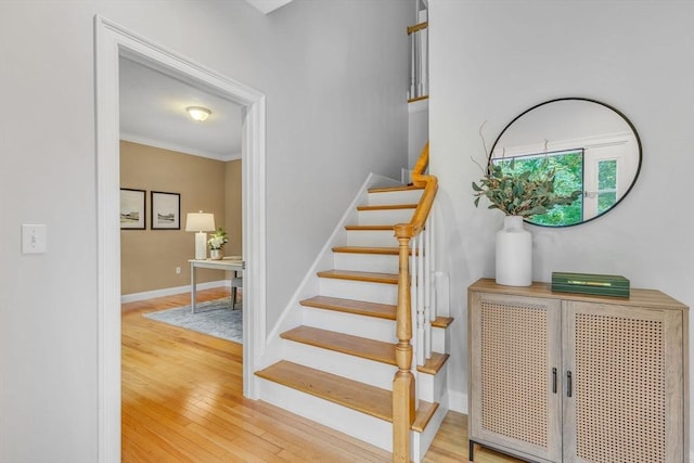 52 Sylvan Dr, Stow, MA 01775 - stairway featuring wood finished floors and ornamental molding
