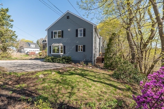exterior space with a yard