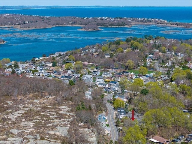 aerial view with a water view and a residential view