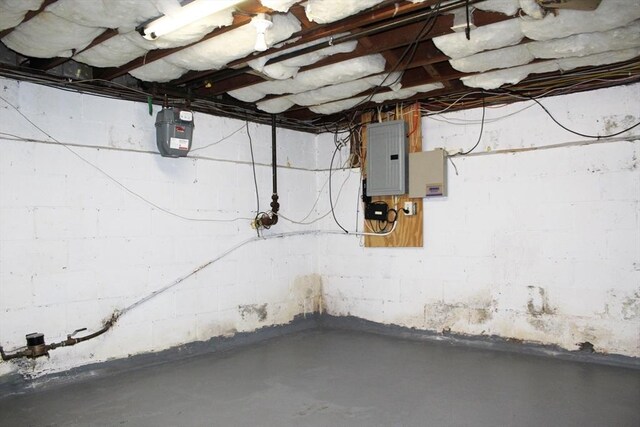 unfinished below grade area featuring electric panel
