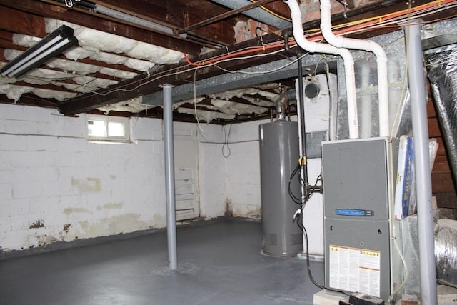 below grade area featuring water heater