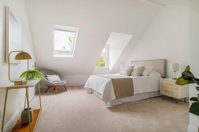 bedroom with carpet and vaulted ceiling