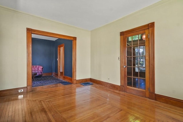 47 Stetson, Haverhill, MA 01835 - spare room featuring baseboards, crown molding, and hardwood / wood-style floors