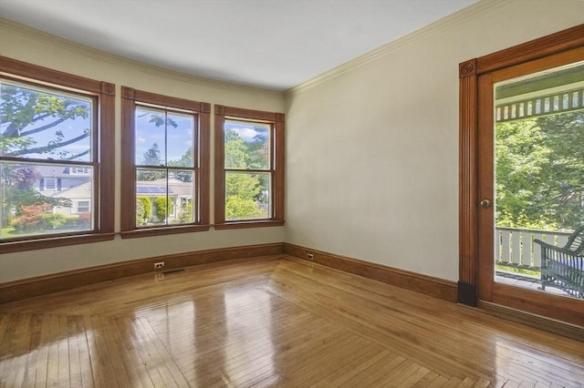 47 Stetson, Haverhill, MA 01835 - unfurnished room featuring crown molding, baseboards, and light wood-style flooring