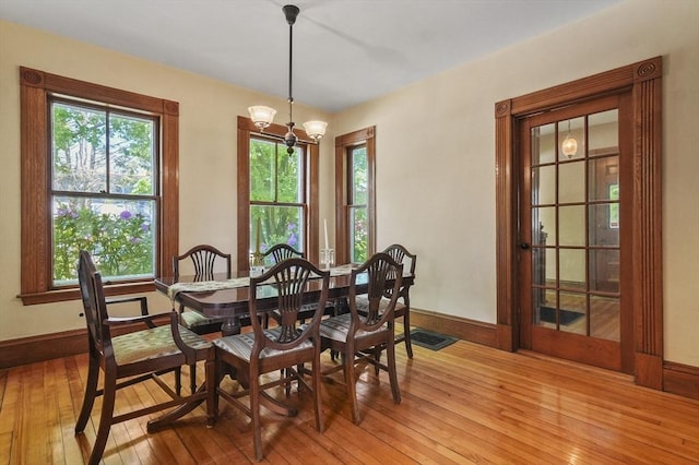 47 Stetson, Haverhill, MA 01835 - dining space featuring light wood-style floors, baseboards, and a chandelier