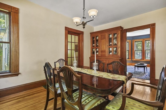 47 Stetson, Haverhill, MA 01835 - dining space with a chandelier, hardwood / wood-style flooring, and baseboards