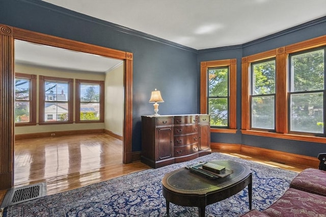 47 Stetson, Haverhill, MA 01835 - sitting room featuring baseboards, wood finished floors, and crown molding