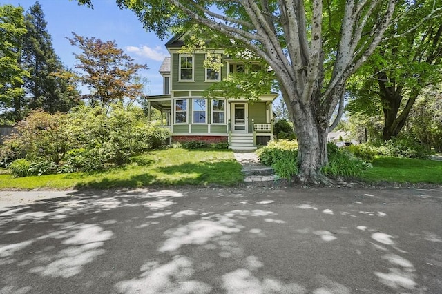 47 Stetson, Haverhill, MA 01835 - victorian-style house featuring a front yard and covered porch