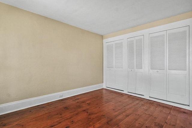 47 Stetson, Haverhill, MA 01835 - unfurnished bedroom featuring dark wood finished floors and baseboards