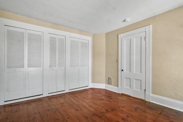 47 Stetson, Haverhill, MA 01835 - unfurnished bedroom with dark wood finished floors and baseboards