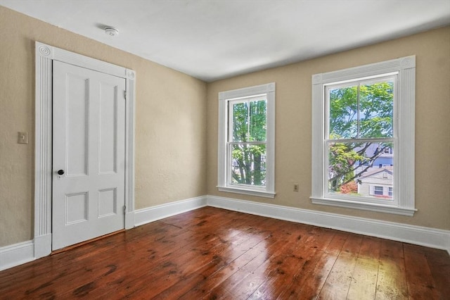 47 Stetson, Haverhill, MA 01835 - empty room featuring wood-type flooring, baseboards, and a smoke detector