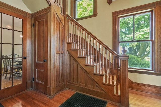 47 Stetson, Haverhill, MA 01835 - staircase with healthy amount of natural light and hardwood / wood-style floors