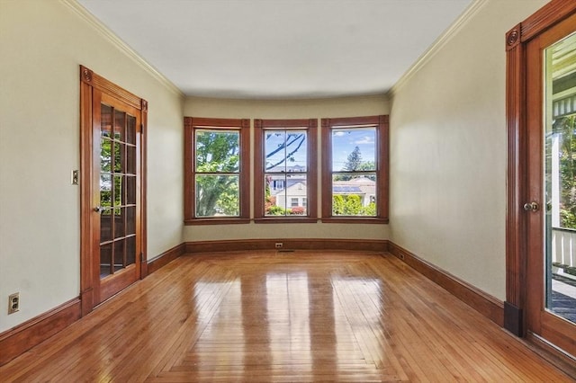 47 Stetson, Haverhill, MA 01835 - unfurnished room featuring hardwood / wood-style flooring, crown molding, and baseboards